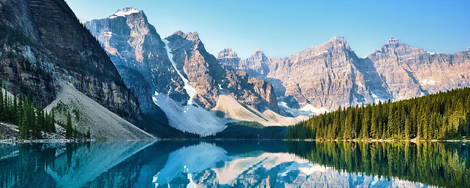 Moraine Lake's turquoise water below the Canadian Rockies in Banff National Park, Canada