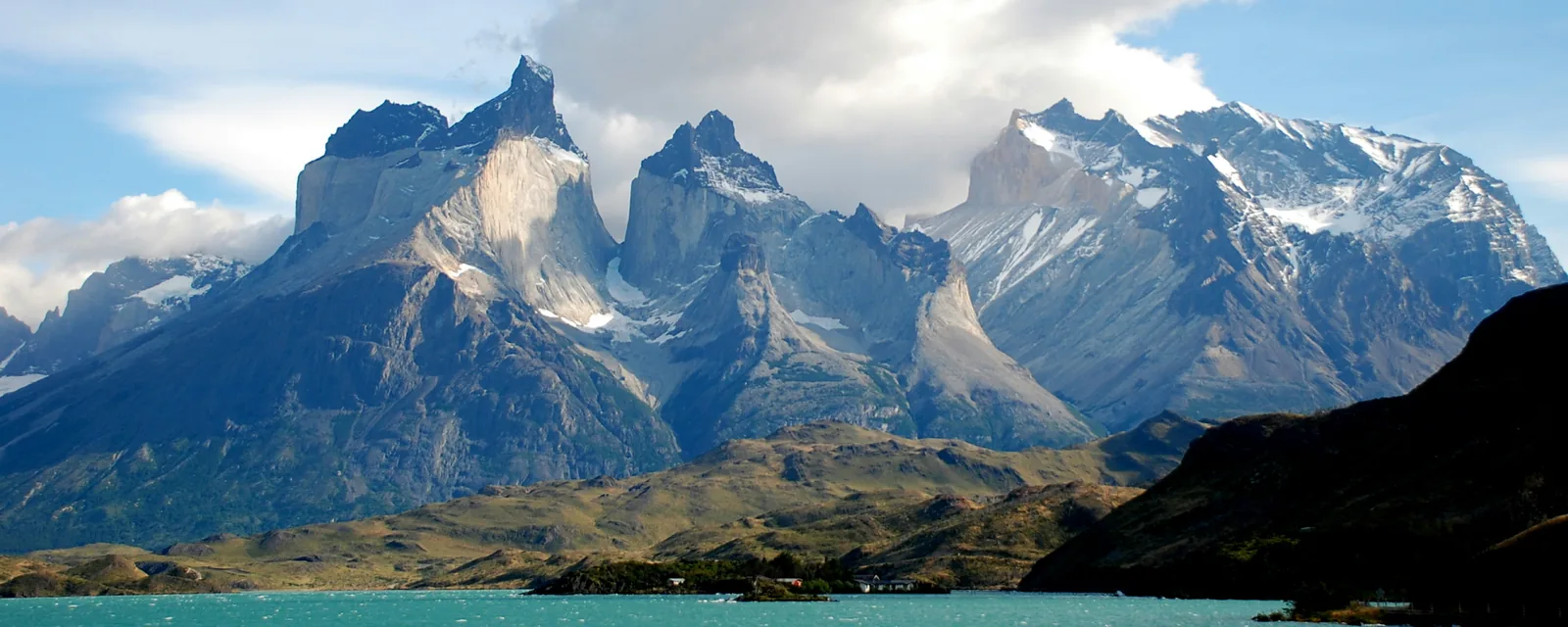 The jagged peaks of Torres del Paine above a turquoise lake, Chile