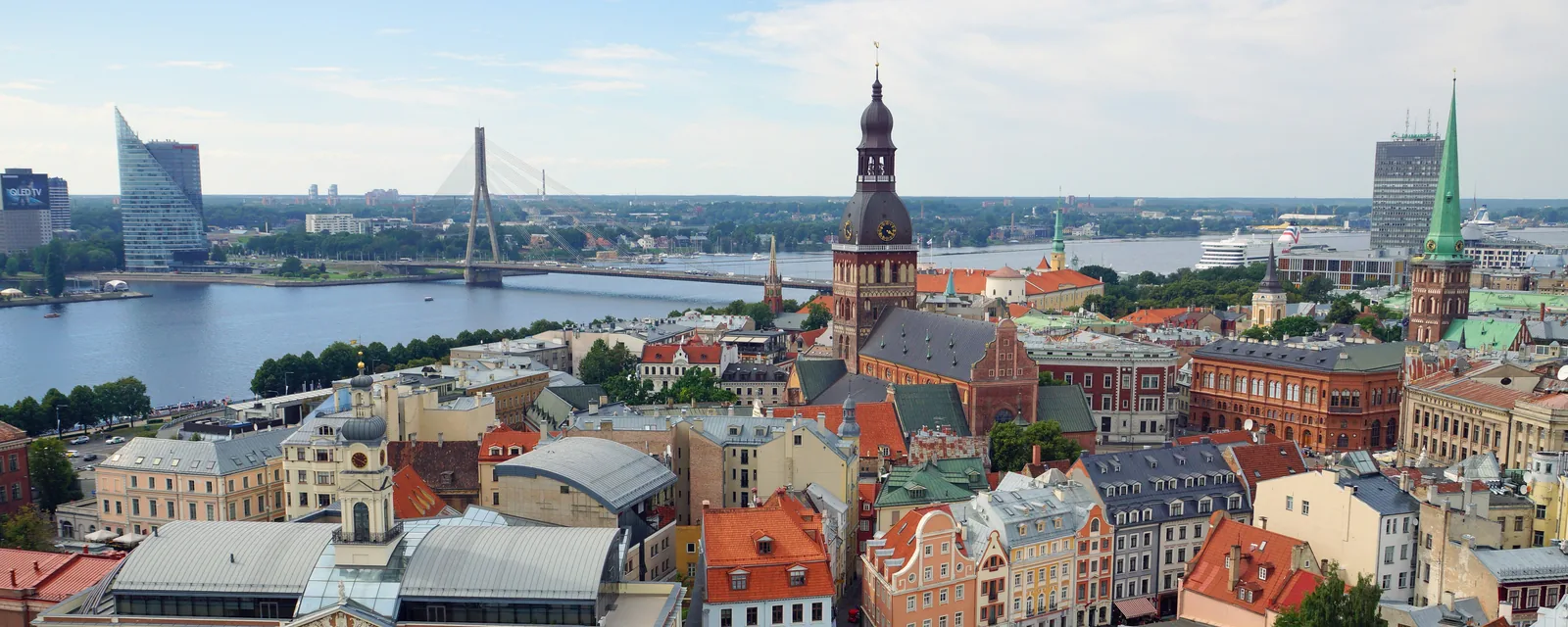 Riga Cathedral, old-town rooftops and the Daugava, Latvia