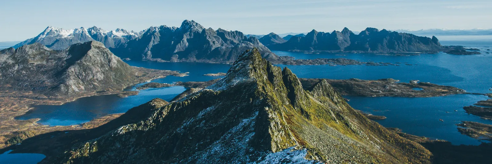 Lofoten's jagged mountains and blue fjords in Norway