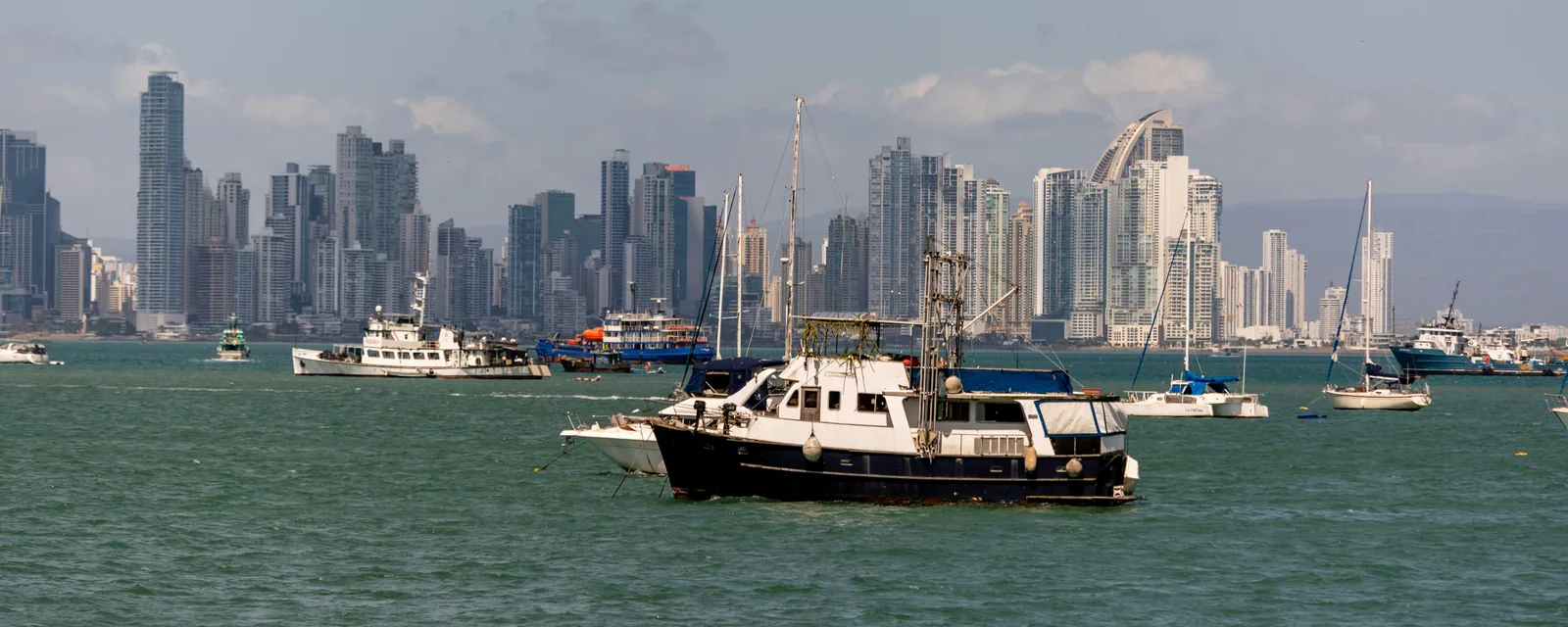 Sailboats on the bay in front of Panama City's skyline, Panama