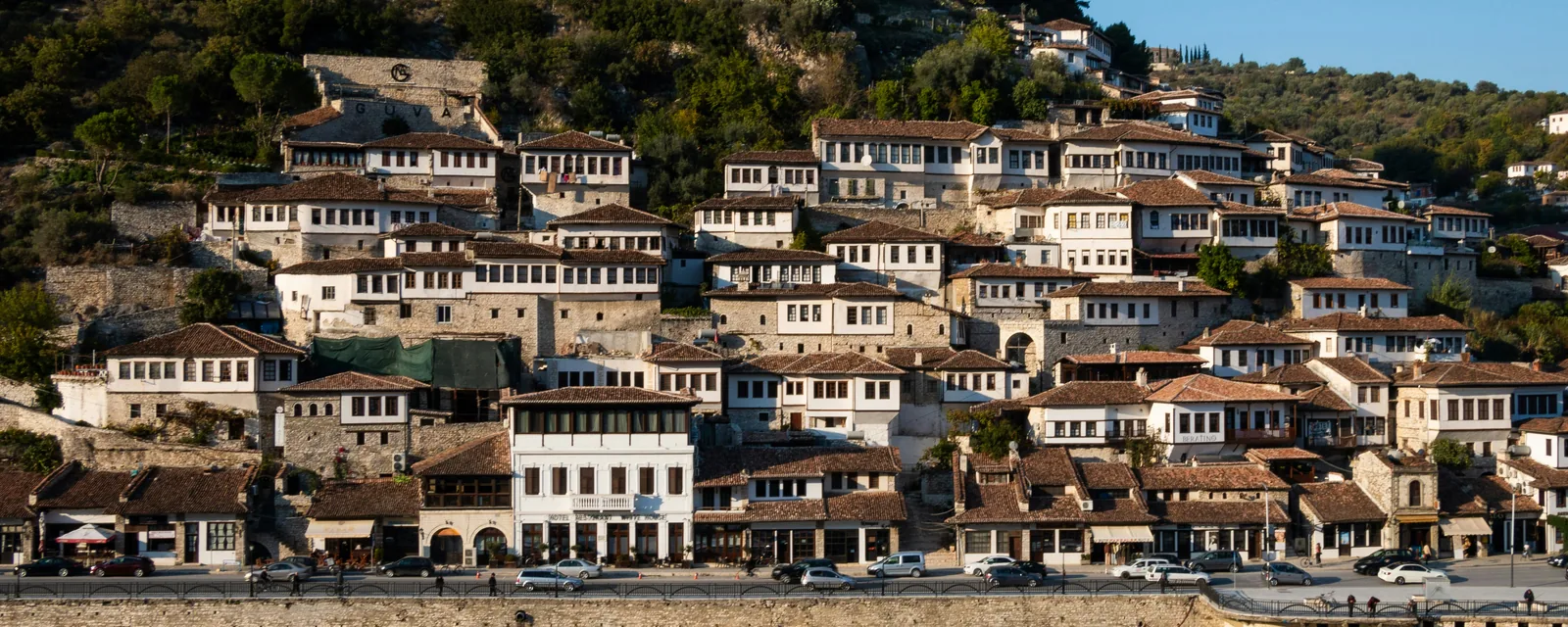 Traditional white Ottoman houses cascading down the hillside in Berat, Albania