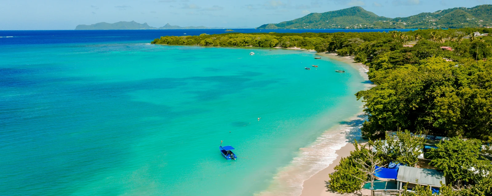 Turquoise water and white sand at Paradise Beach, Carriacou, Grenada