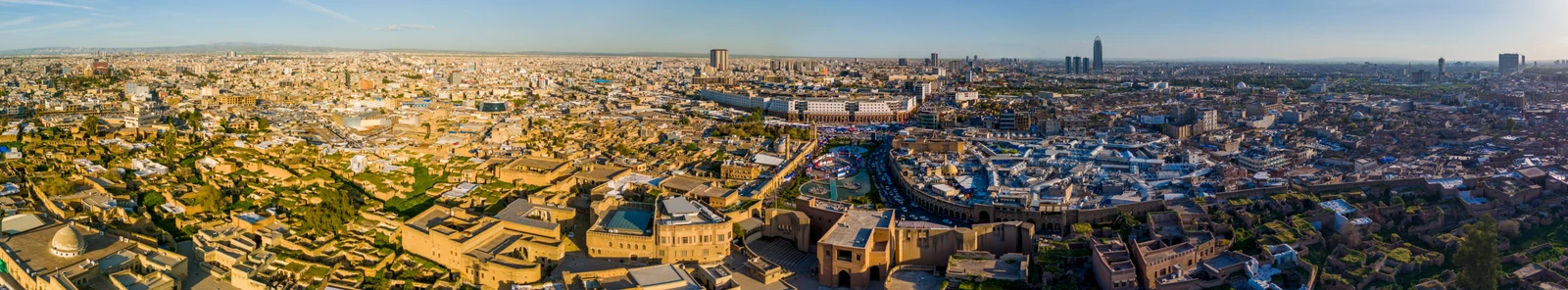 Golden sunlight over the historic citadel and city centre of Erbil, Iraq