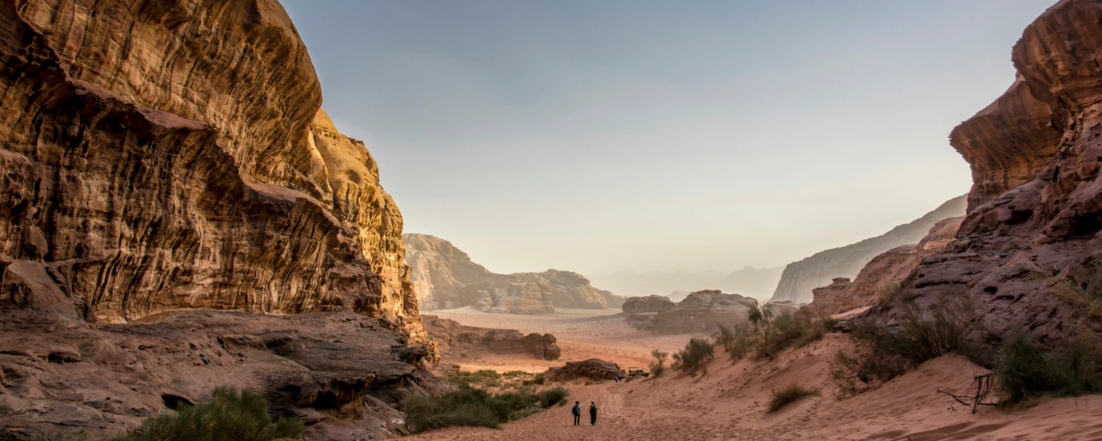 Golden light between the sandstone cliffs of Wadi Rum, Jordan