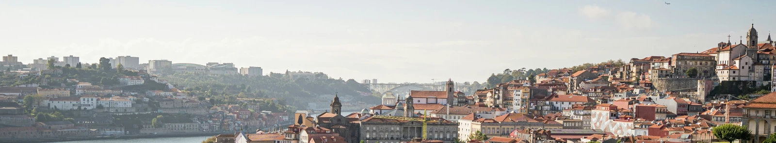 Portoβs terracotta rooftops and waterfront beside the Douro River, Portugal