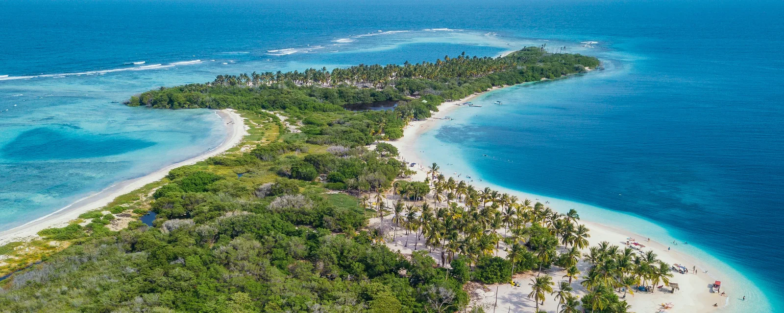 Palm-fringed white beaches and turquoise reefs around Cayo Sombrero in Venezuelaβs Morrocoy National Park